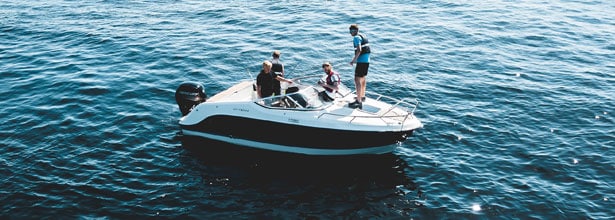 family on a recreational boat