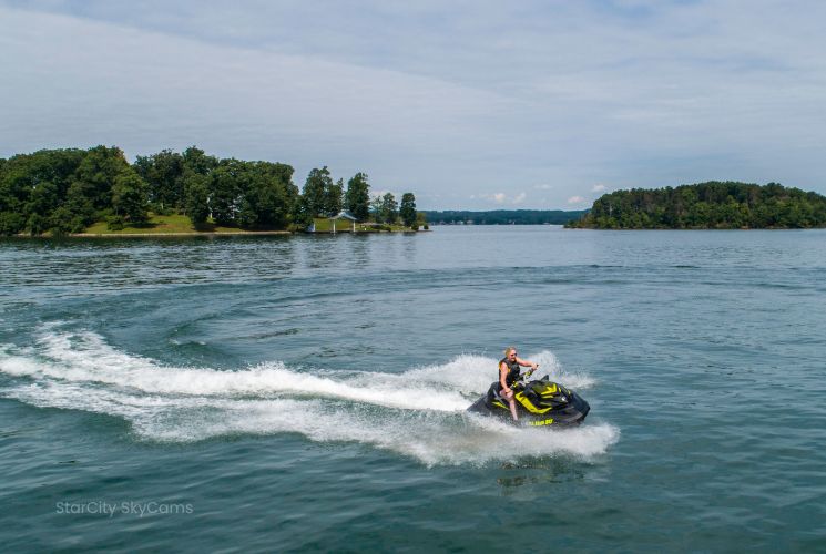 A Smith Mountain Lake jet ski zips along the water