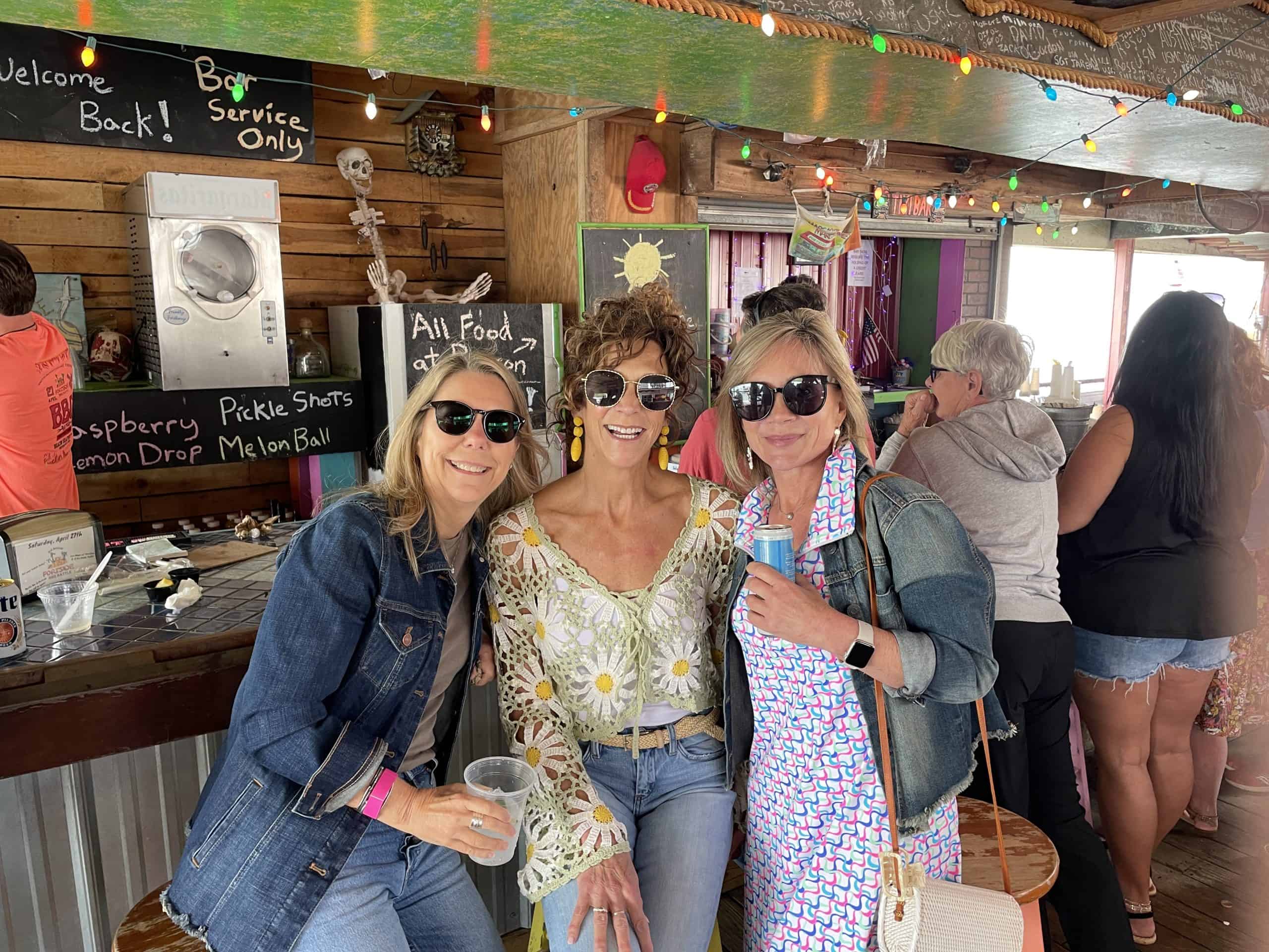 Brian and Lisa Raub on deck overlooking the water