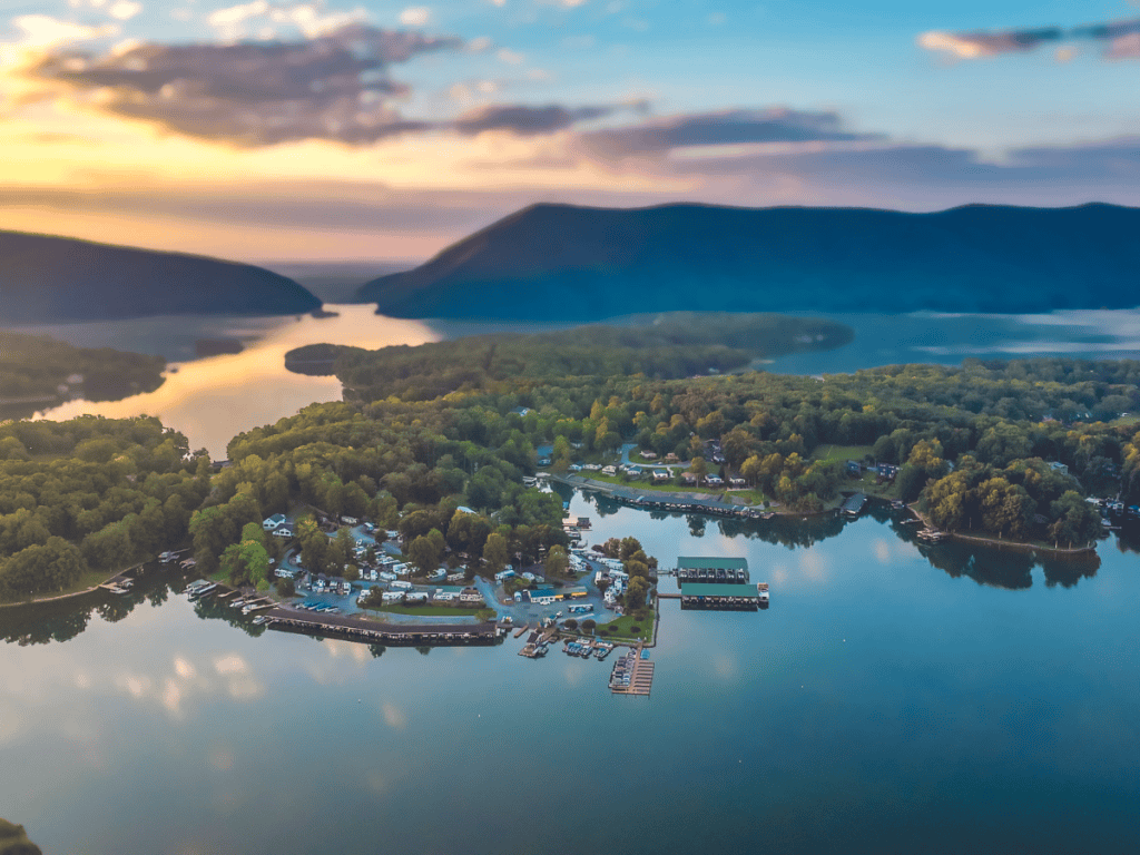 Sunrise over Smith Mountain Lake illuminating Mitchell's Point Marina at SML, Virginia.