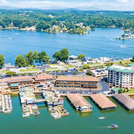 Brian and Lisa Raub on deck overlooking the water